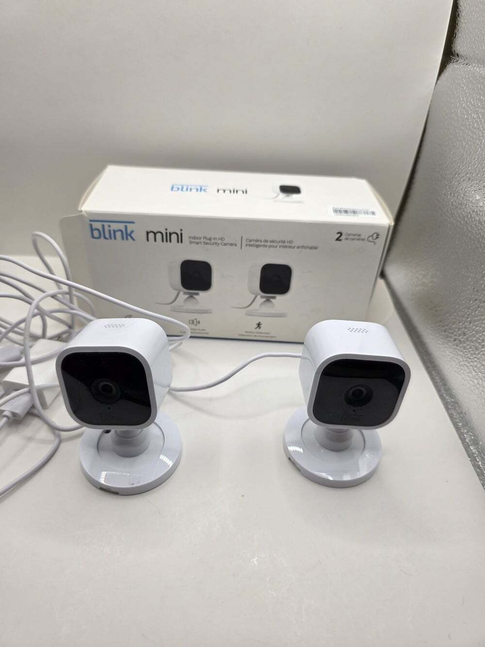 Blink Mini Indoor Plug-in HD Smart Security Camera (2-Pack) - Two-Way Audio